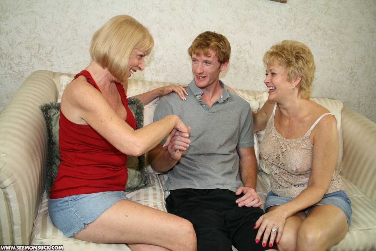 Fat cock shared between two mature lovelies, with a lucky student in the middle.