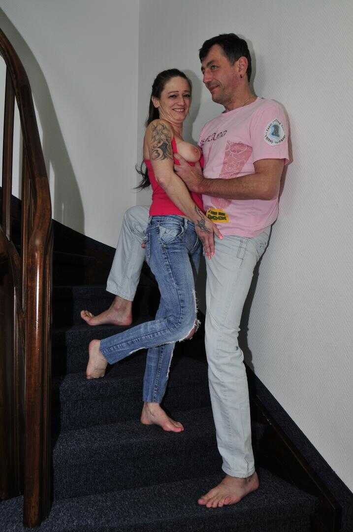 Steamy Stairway Encounter with Adrienne Kiss and Her German Swinger Couple - Adrienne Kiss
