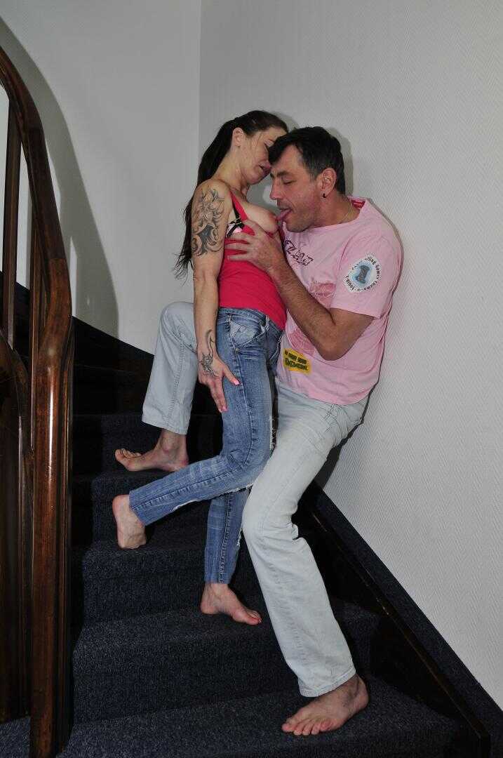 Steamy Stairway Encounter with Adrienne Kiss and Her German Swinger Couple - Adrienne Kiss