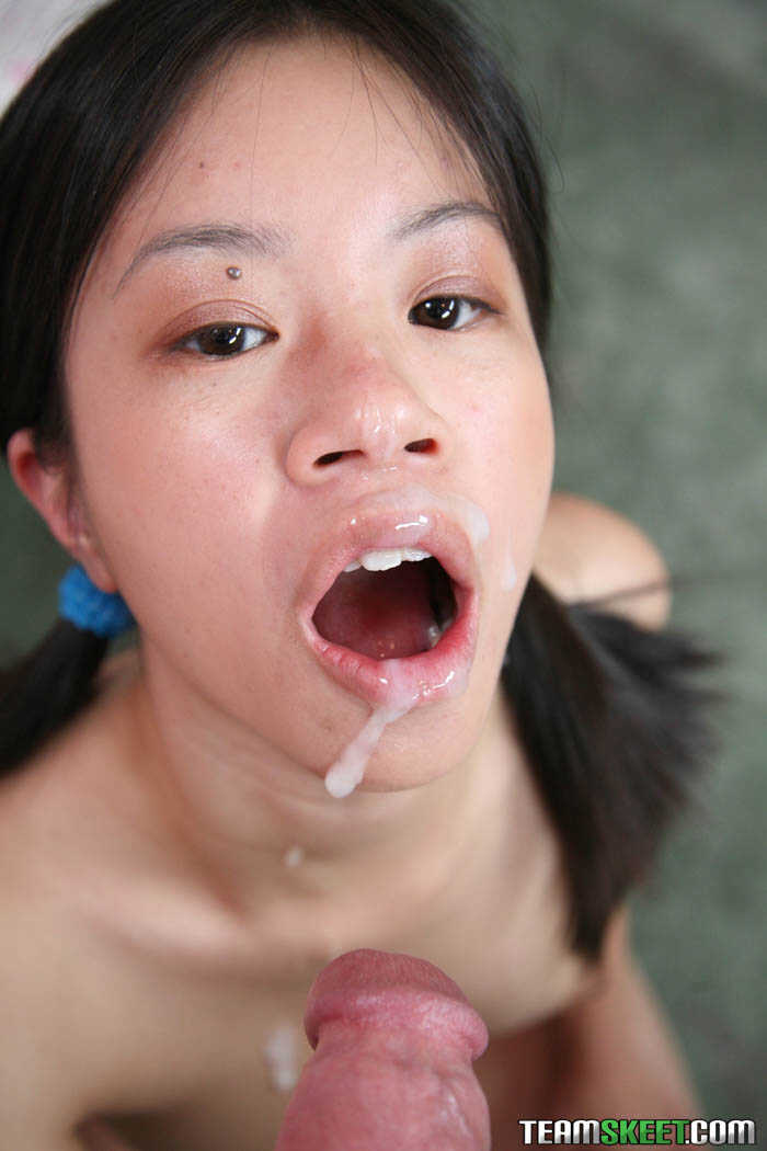 Tiny Asia Zo Sheds Her Schoolgirl Skirt to Catch a Load on her Adorable Face! - Asia Zo