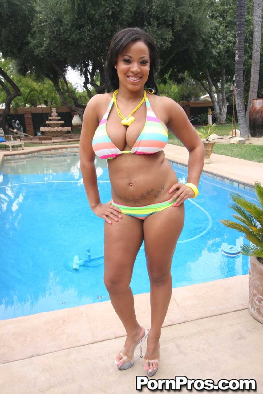 Chubby buxom ebony Natasha Dulce flaunts her massive natural tits on the poolside! - Natasha Dulce