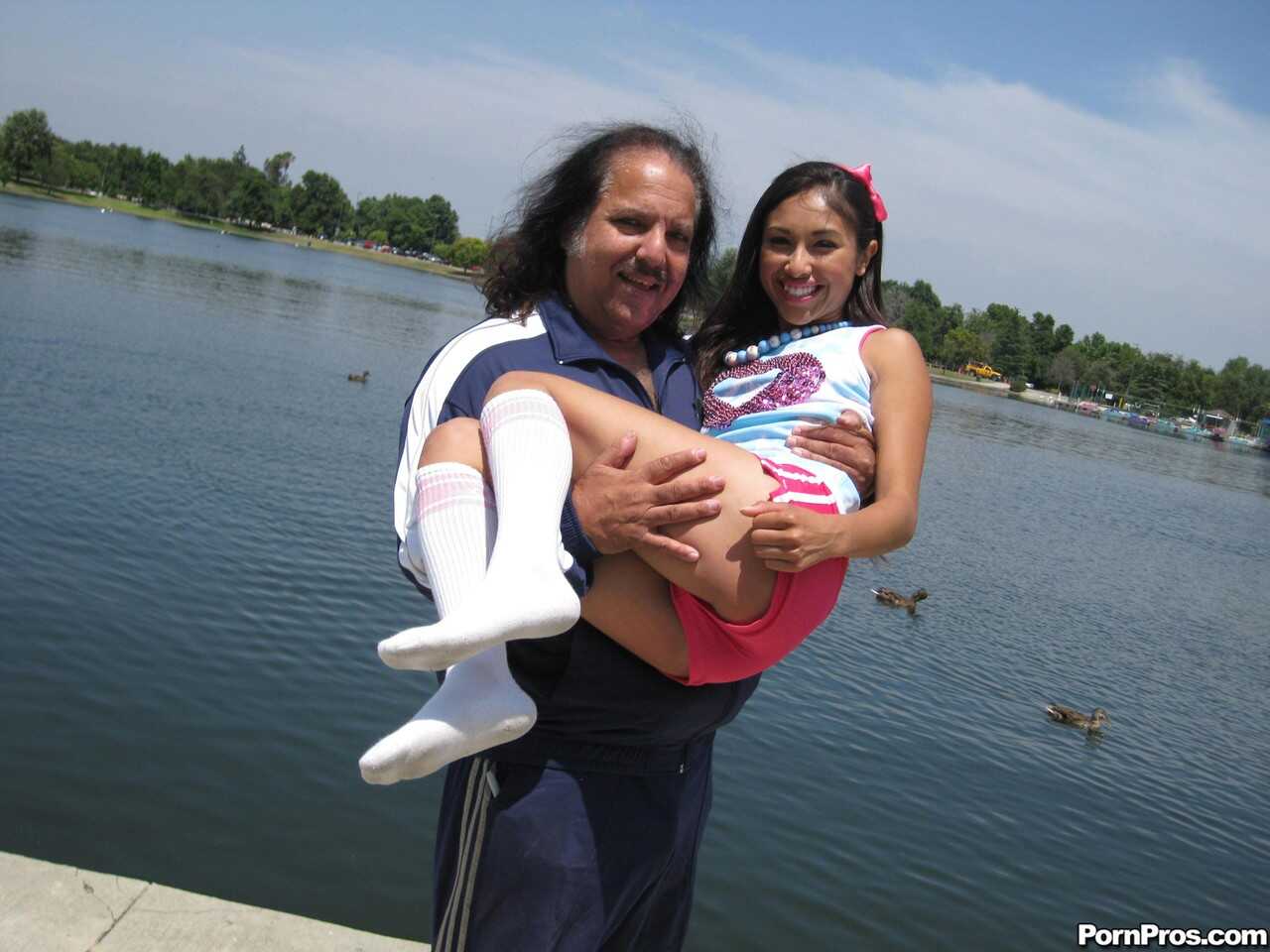 Sexy Asian teen doll in the park with Ron Jeremy, getting off on nature’s beauty