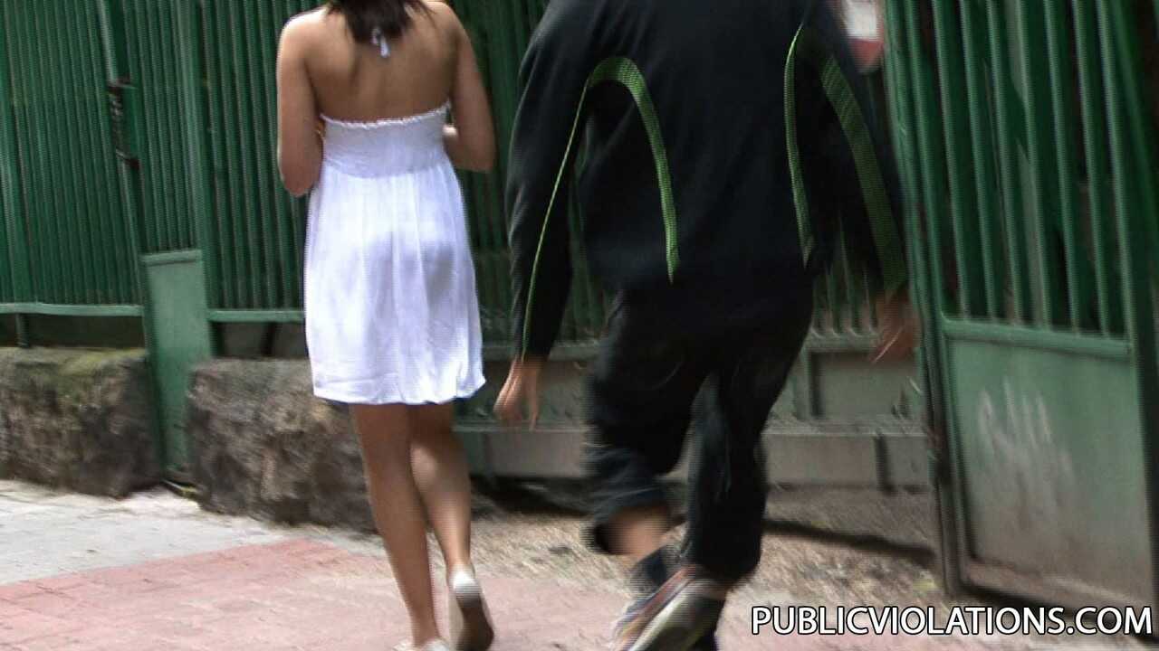 Busty Brunette’s Boobs Bared as Stranger Grasps Them in Public