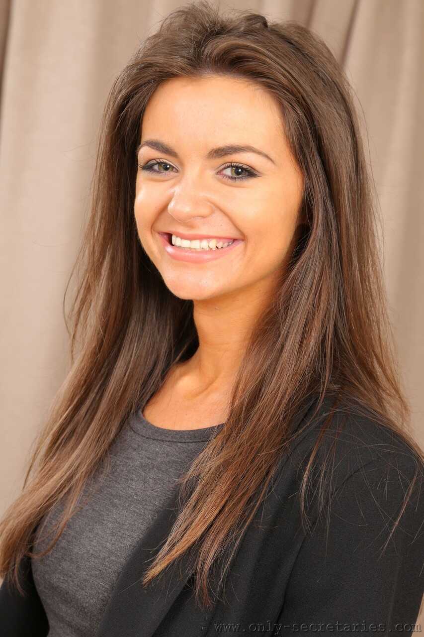 Smiley teen Tianna loses uniform and bra to pose half naked in pantyhose with her hot slutty secretary legs - Tianna