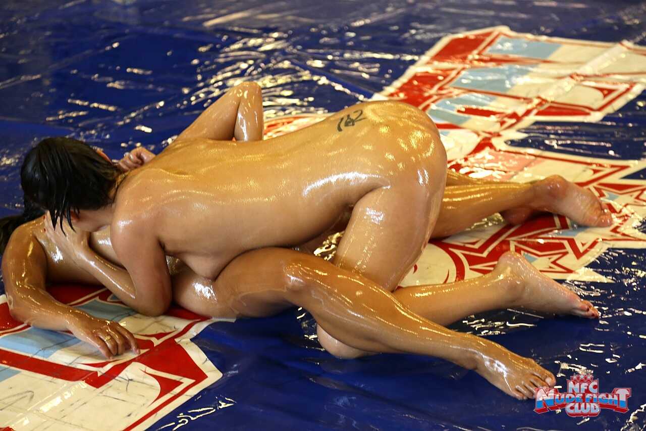 Madlin Moon Takes On the Sexy Brunette Babes for a Sweaty Wrestling Match While They Enjoy Hot Lesbian Action - Madlin Moon