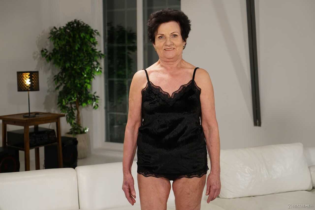 Naughty Latina grandma Lisbeth strips and shows off her pussy and big ass - Lisbeth, Mugur