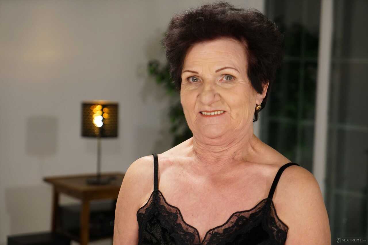 Naughty Latina grandma Lisbeth strips and shows off her pussy and big ass - Lisbeth, Mugur