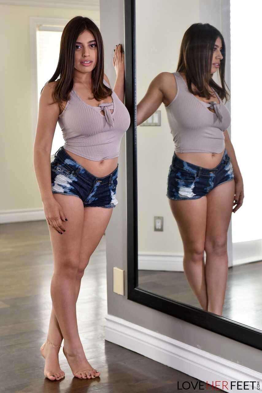 Chubby busty Ella Knox frees her huge natural tits to pose naked on the floor with her small feet and hairy pussy - Ella Knox