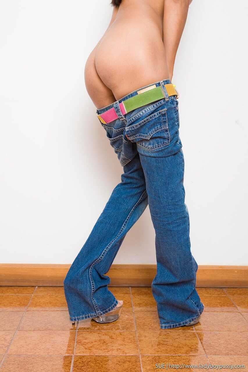 Hot shemale Sue doffs jeans to show nice tits and small ass with a bottle - Ladyboy Sue