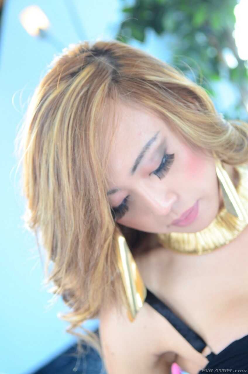 Sexy Asian ladyboy Chanel Couture plays with her oily tits and cock in lingerie from Venus Lux's closet - Chanel Cout...