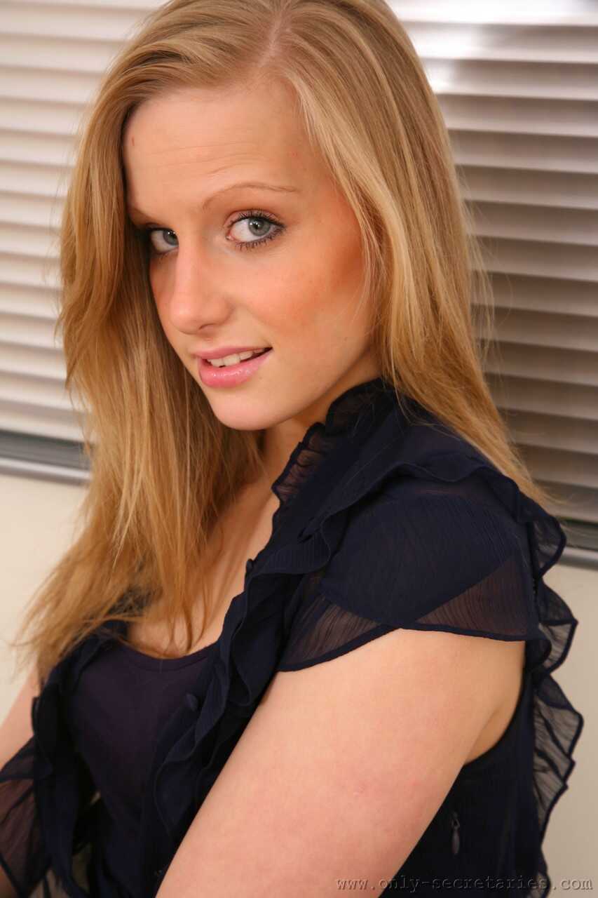 Hot pretty blonde Annie M undresses & reveals her perky nipples in the office - Annie M