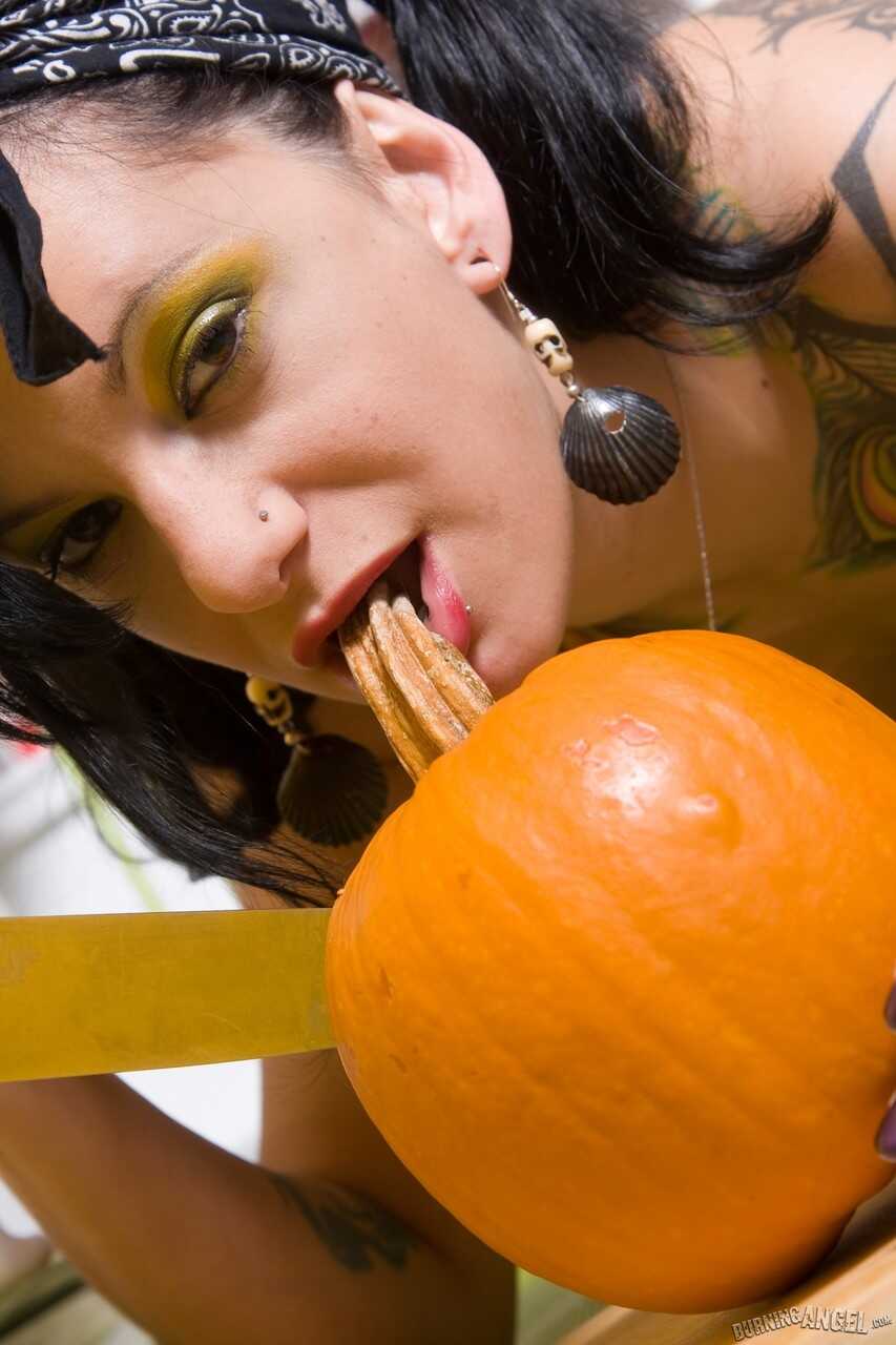 Dark Delight: A Boobalicious MILF Finger-Fucking Her Pumpkin in the Park - 