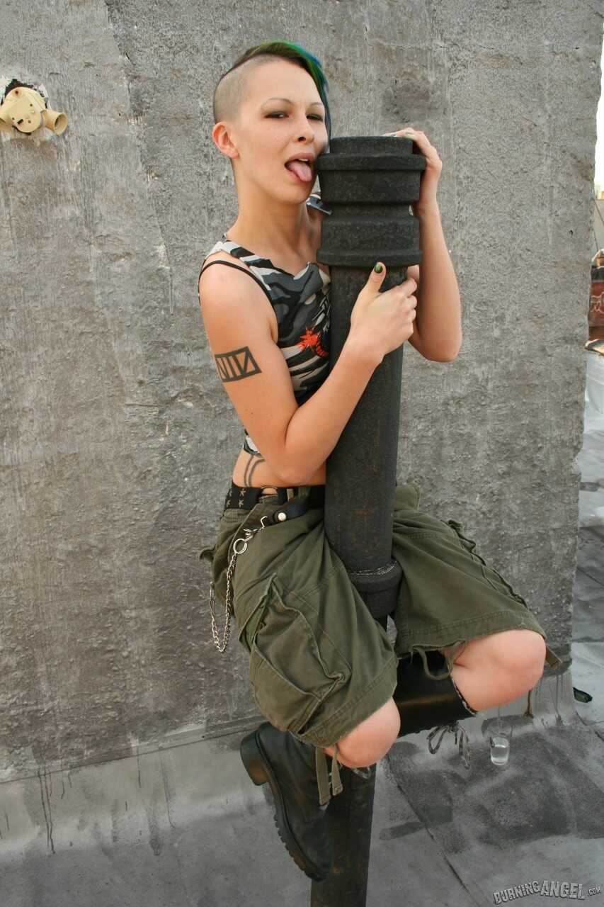 Green-haired army girl strips down and exposes her pierced nipples and trimmed bush - Chapel Waste