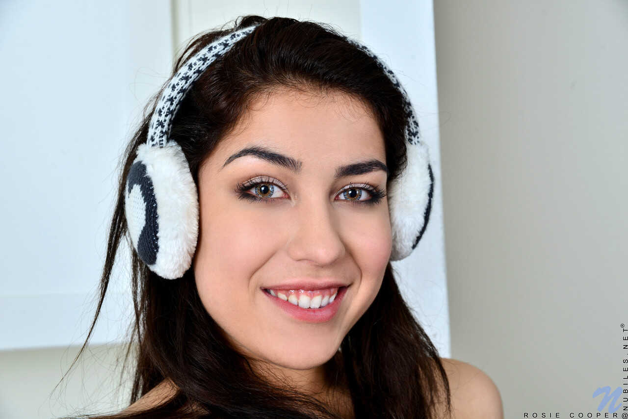 Brunette solo girl Rosie Cooper shows her pink pussy with headphones on - Rosie Cooper