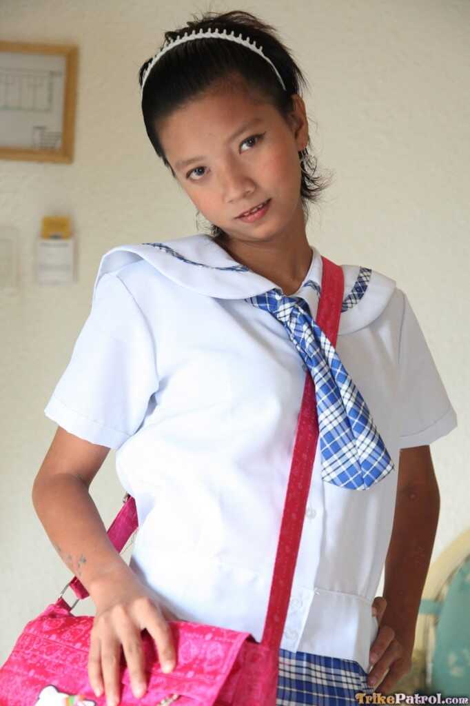 Petite Filipina schoolgirl Sally in uniform upskirts with her sexy Asian panties! - Sally