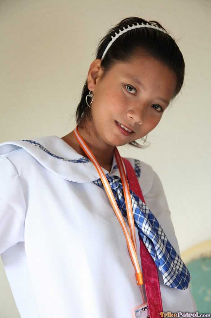 Petite Filipina schoolgirl Sally in uniform upskirts with her sexy Asian panties!