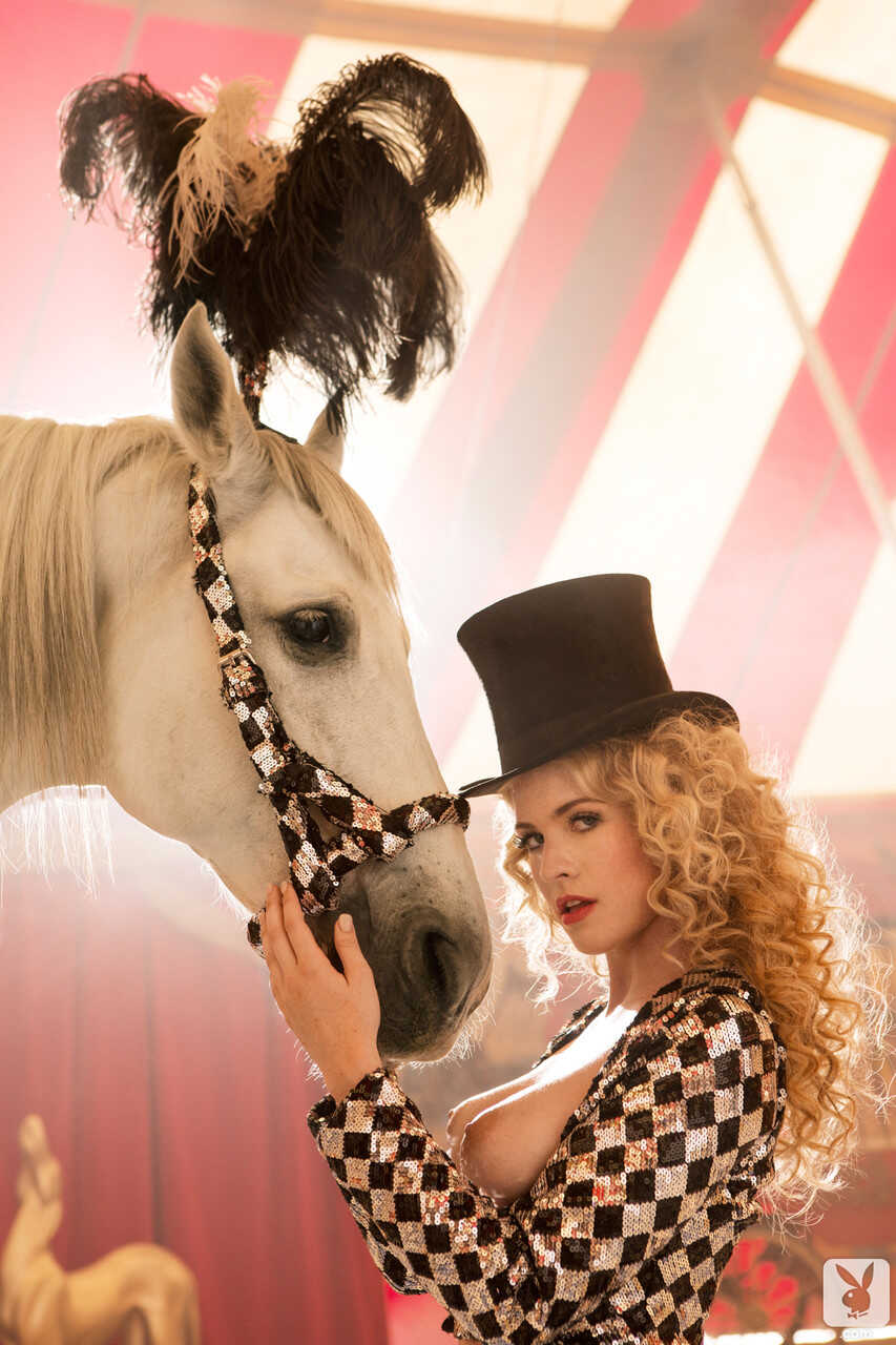 Carly's Riding High: The Blonde Bombshell Saddles Up on a Stallion in Lace and Boots - Carly Lauren