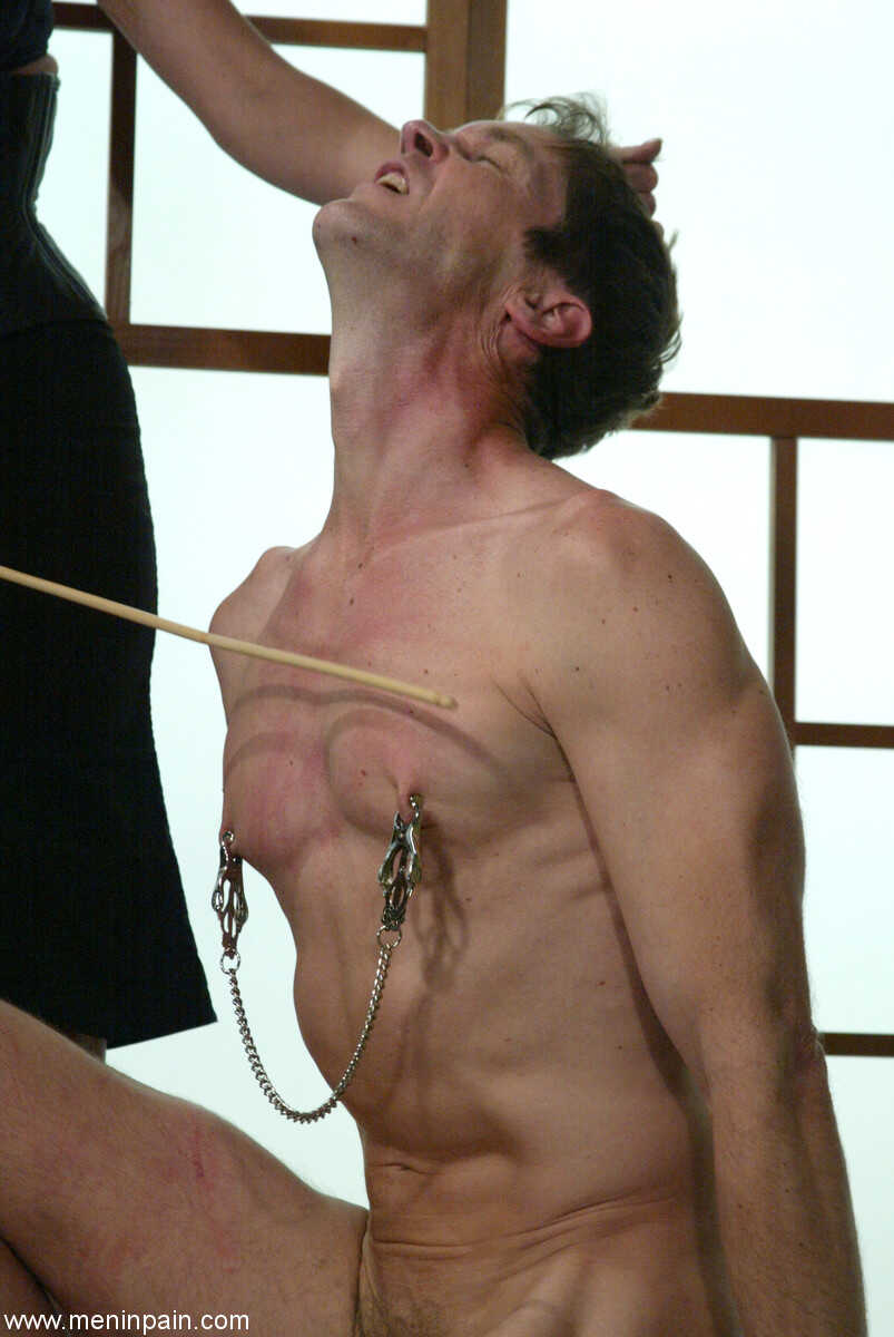 Dressed mistress Audrey Leigh tortures naked man Lakko's breasts and nipples with her stilettos. - Audrey Leigh, Lakko