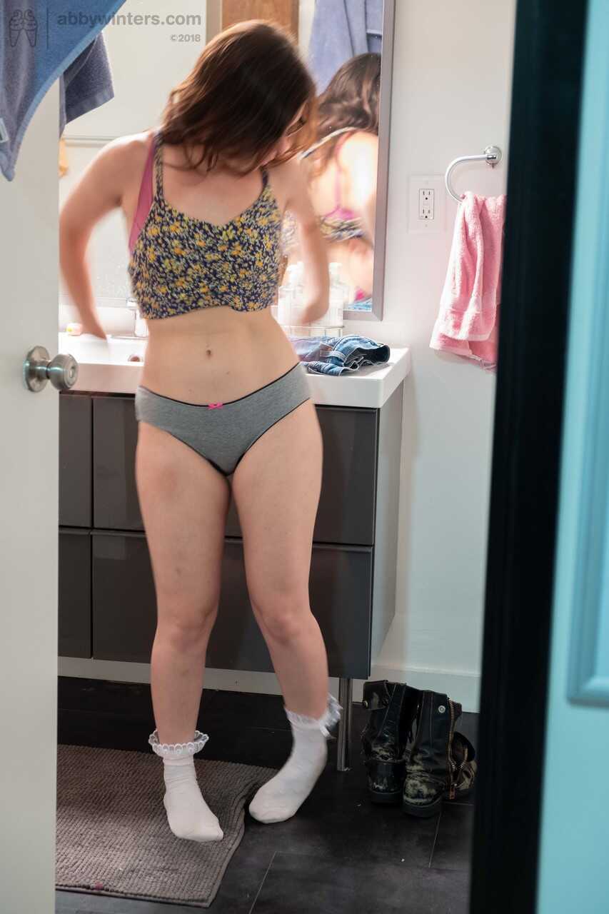 Juliette M's Hairy Pussy Exposed as She Changes Clothes in the Bathroom - Juliette M