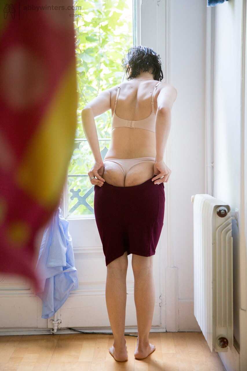 Yasmeena's Bushy Cover-Up: A Naked Asian Amateur Gets Dressed with a Hairy Bush - Yasmeena