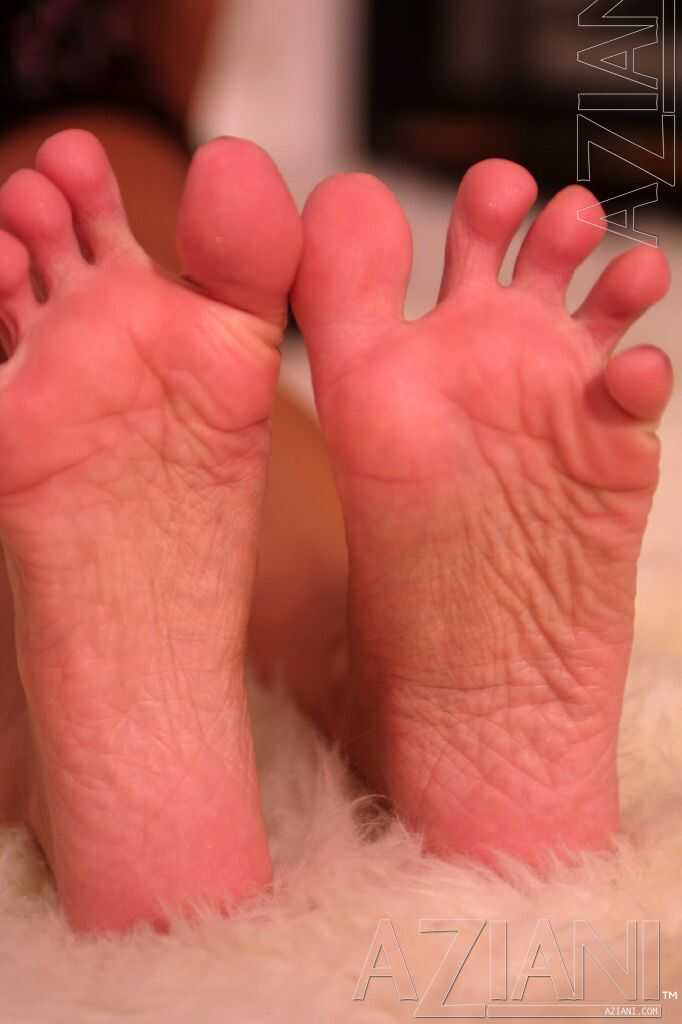 Sexy Brunette Crissy Moran Licks Her Toes After Revealing her Fake Titties and Showing Off Her MILF Feet - Crissy Moran