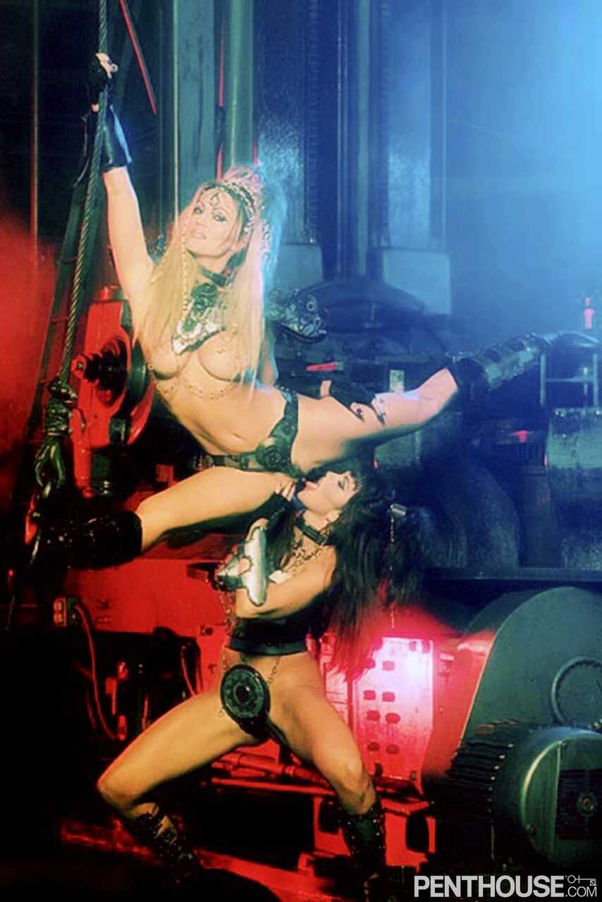 Lusty lesbian duo Gina La Marca and Janine Lindemulder slip into their slinky costumes for a night of passionate fucking