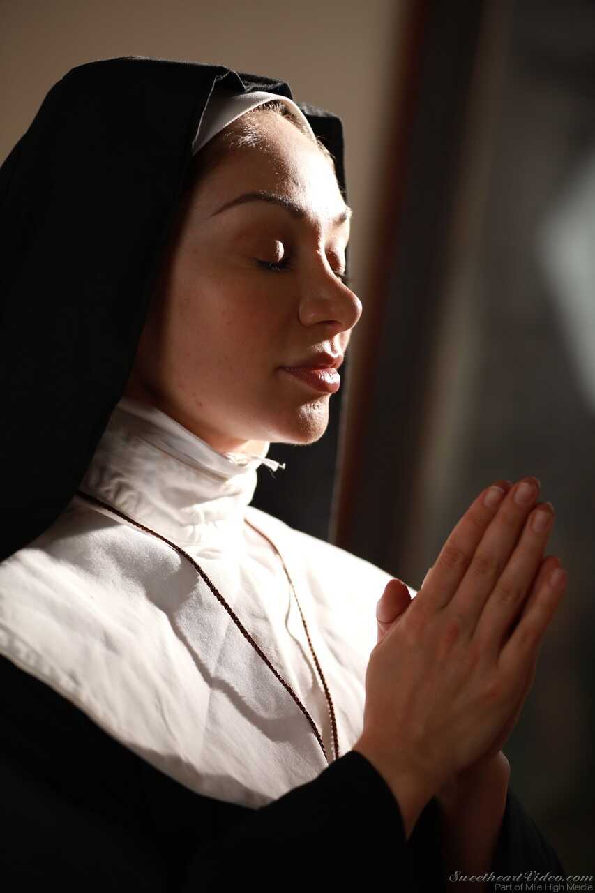 Naughty nun Lea Lexis strips and masturbates on the floor in white stockings and tight ass - Lea Lexis