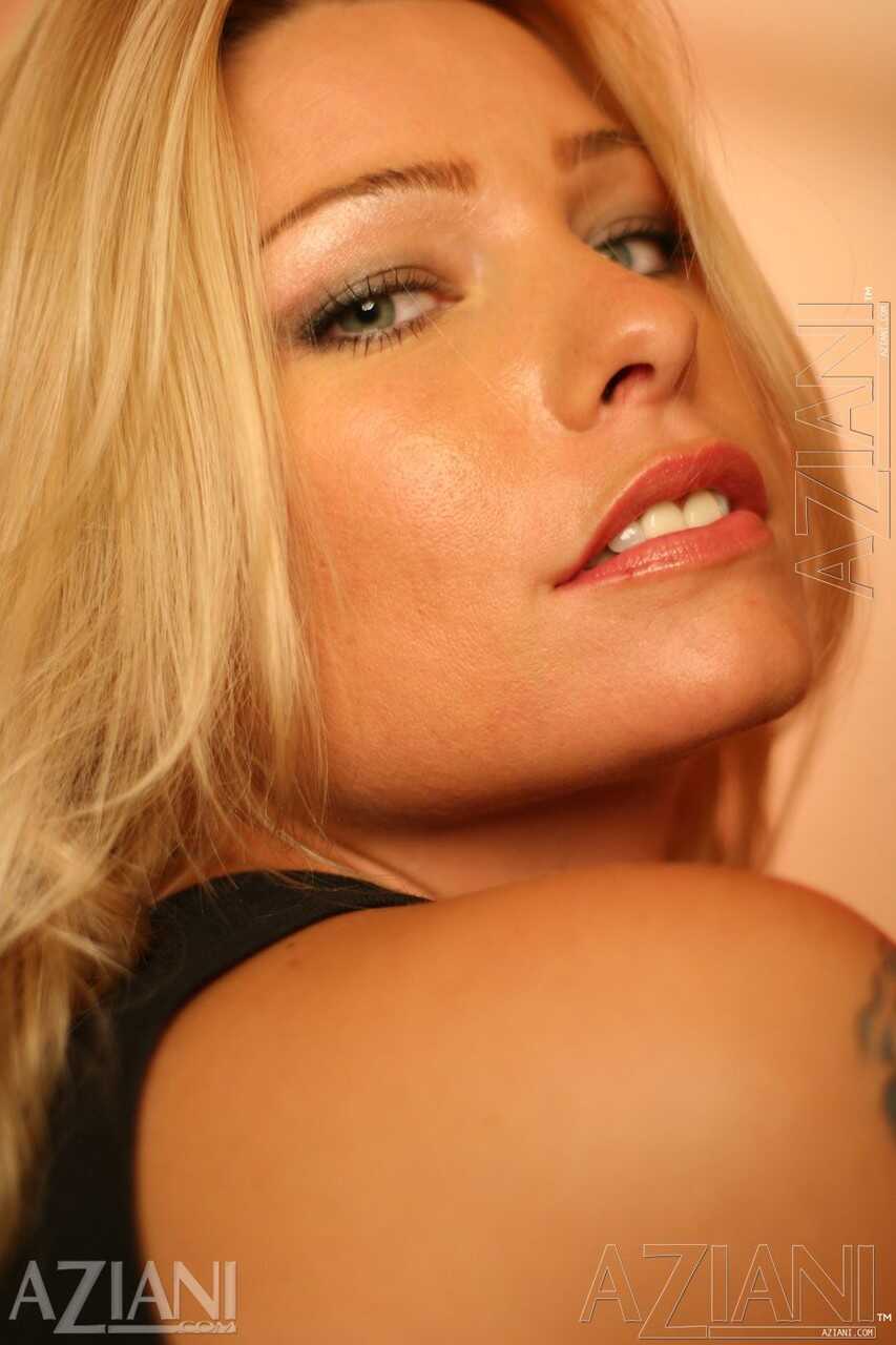 Blonde hottie Tricia Tyler rubs her pussy and ass in a bottomless striptease - Tricia Tyler