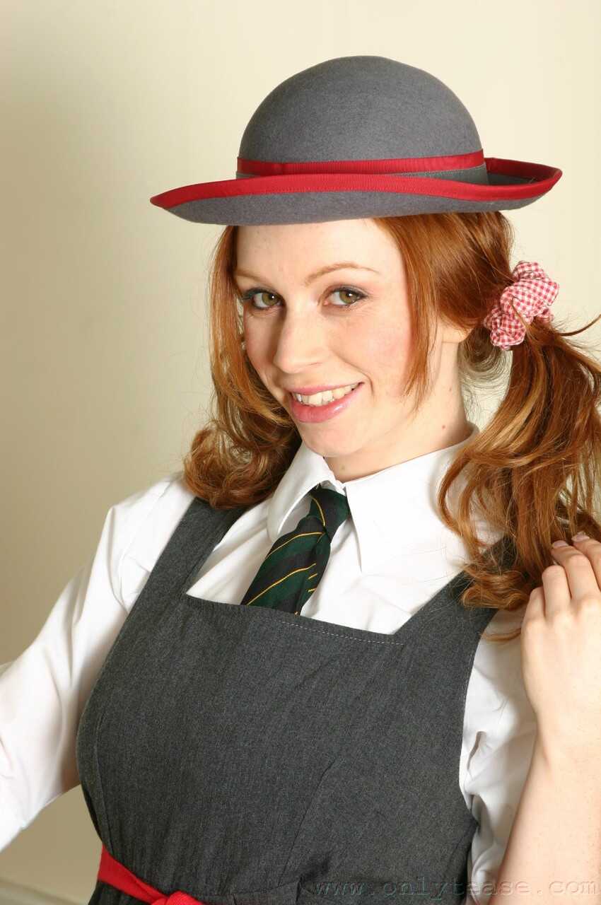 Lovely school girl Alexandra takes off her uniform and reveals tits in solo pantyhose skirt - Alexandra