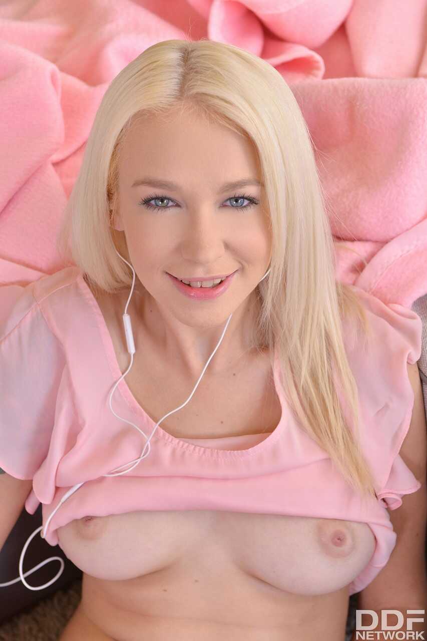 Blonde sweetie Arteya exposes her hot bosom and masturbates with a lollipop while dreaming of a Russian teen solo solo pus...