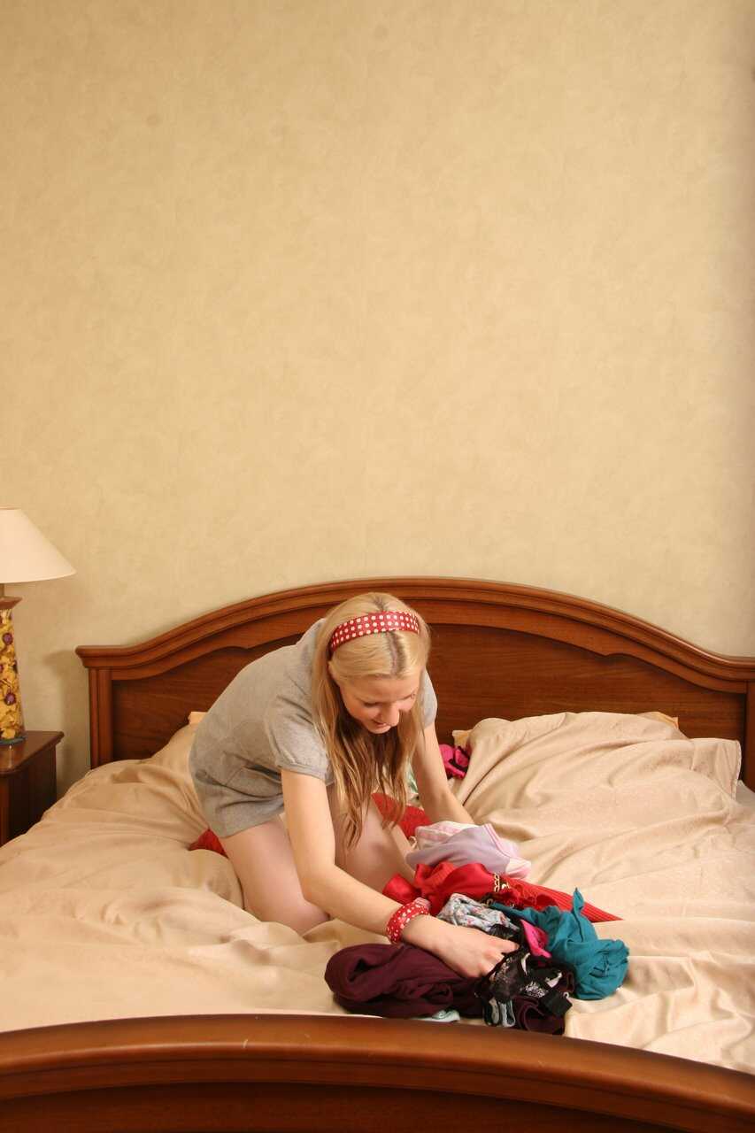 Delicious amateur teen Barby stripping and posing in her hot lingerie - Barby