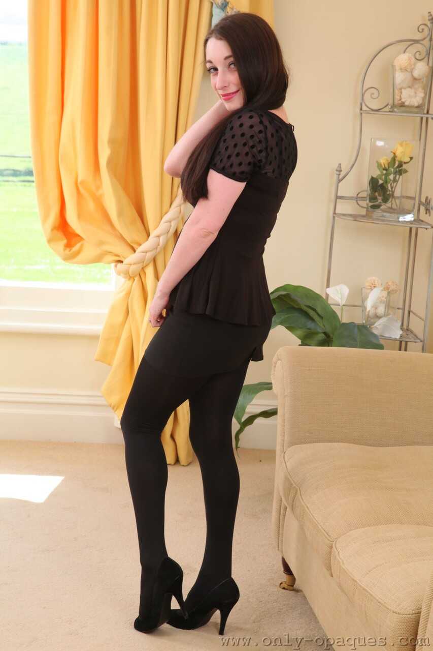 Busty Brunette Gemma Lou Lets Her Stockings Slip While Posing In The Buff - Gemma Lou