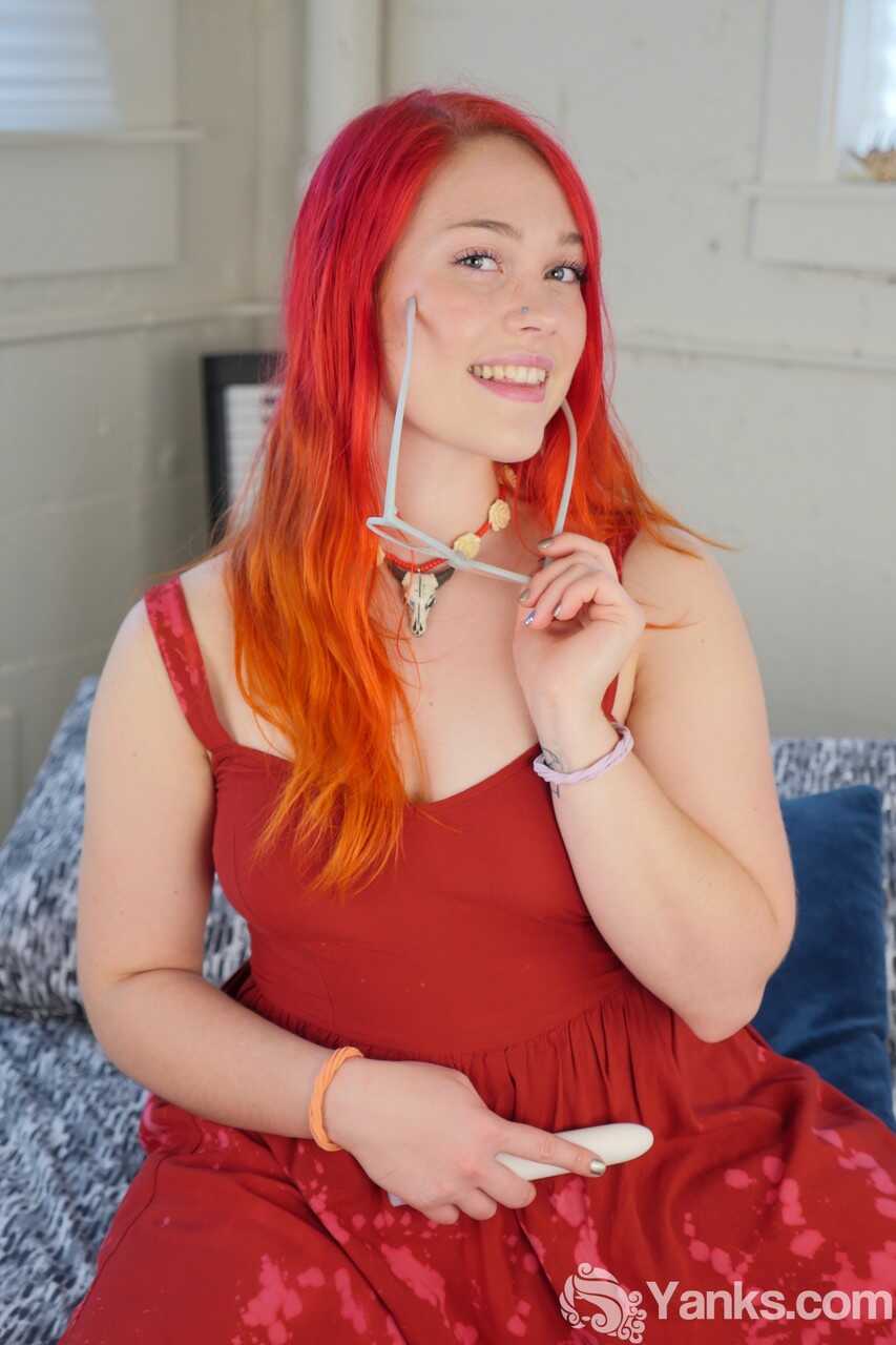 Adorable redhead Jennavive Marie gets fucked by a big dildo while teasing her glasses-clad eyes in a solo masturbation ses...