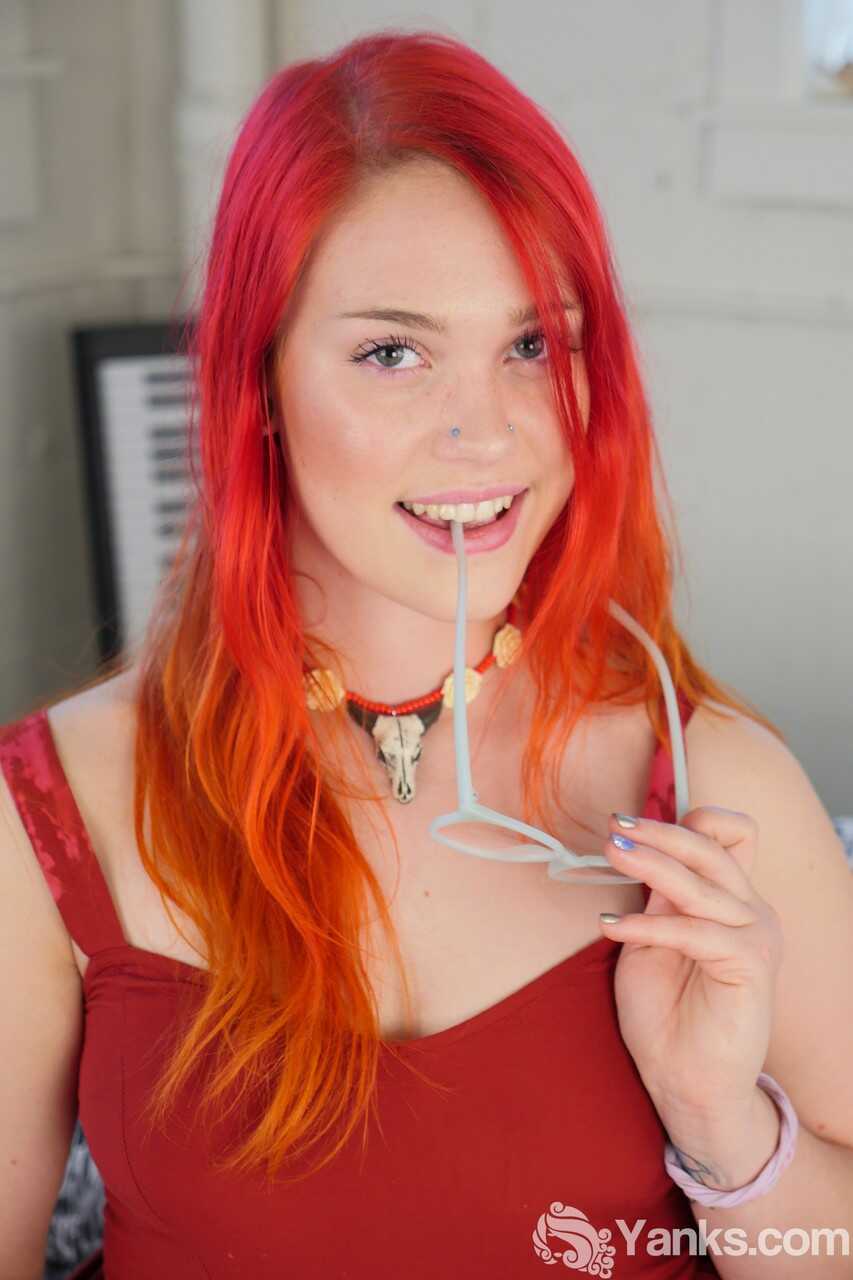 Adorable redhead Jennavive Marie gets fucked by a big dildo while teasing her glasses-clad eyes in a solo masturbation session