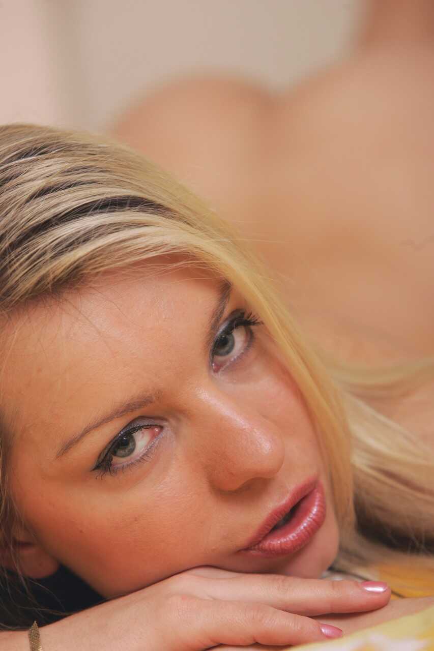 Blonde teen Miriam ass doffs her lingerie to show off her trimmed pussy and natural titties - Miriam