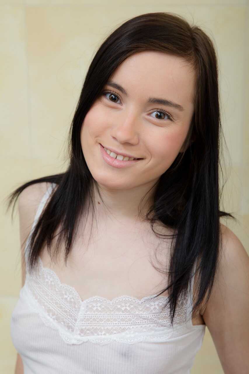 Skinny babe Delphina gets wet and wild with a giant dildo in the bathroom - Delphina