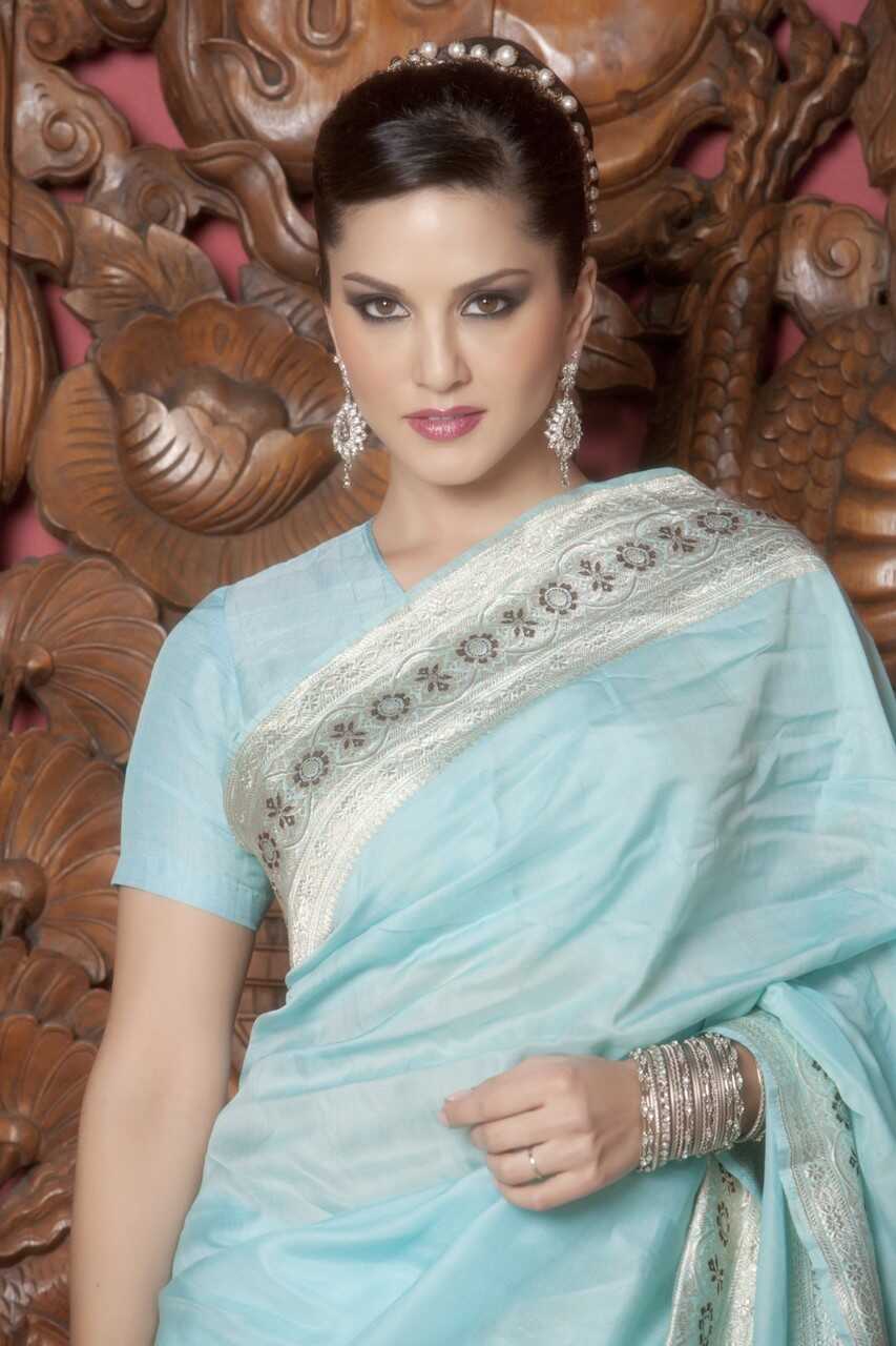 Sunny Leone's Angels and Demons: An Indian Milf with Fake Boobs and a Juicy Pussy Showcases Her Curvy Body and Lustfu...