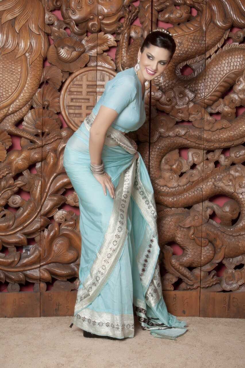 Sunny Leone's Angels and Demons: An Indian Milf with Fake Boobs and a Juicy Pussy Showcases Her Curvy Body and Lustfu...