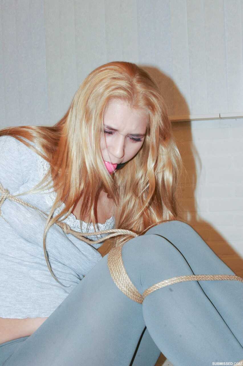 Linda Ray's Naughty Bondage Fantasy: Blonde Bombshell Tied up in Tight Hot Pants Begging for Release from Gagball and...