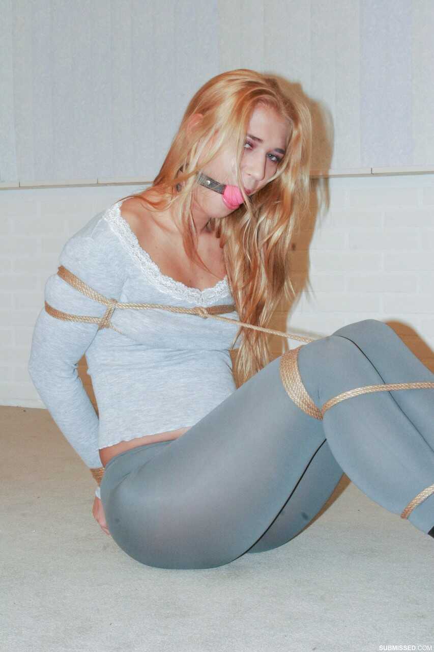 Linda Ray's Naughty Bondage Fantasy: Blonde Bombshell Tied up in Tight Hot Pants Begging for Release from Gagball and...