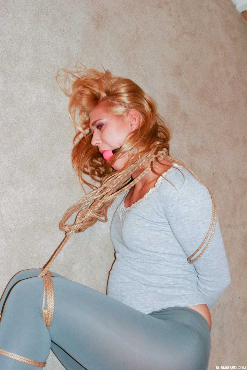 Linda Ray's Naughty Bondage Fantasy: Blonde Bombshell Tied up in Tight Hot Pants Begging for Release from Gagball and...