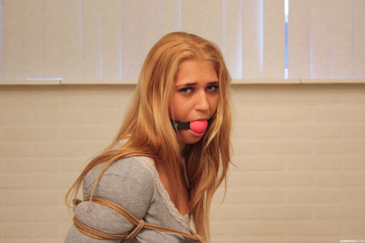 Linda Ray's Naughty Bondage Fantasy: Blonde Bombshell Tied up in Tight Hot Pants Begging for Release from Gagball and...