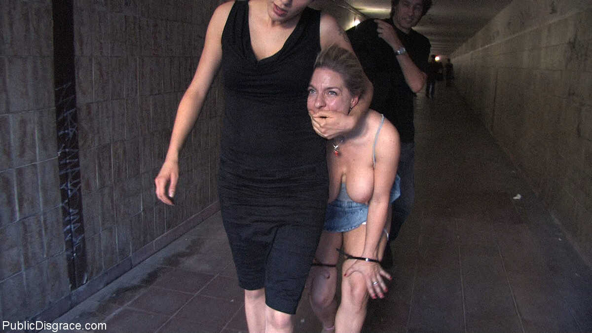 Blonde Lady Jagdelfe Gets Publicly Shamed and Humiliated by a Wild Couple with Big Tits - Jagdelfe