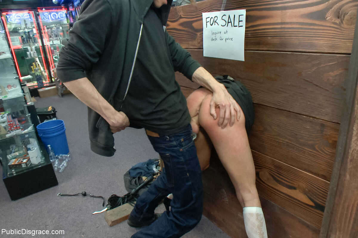 Teen Riley Reid gets fisted and rammed while in a sex shop pillory for public BDSM mistress Chanel Preston and Xander Corv...