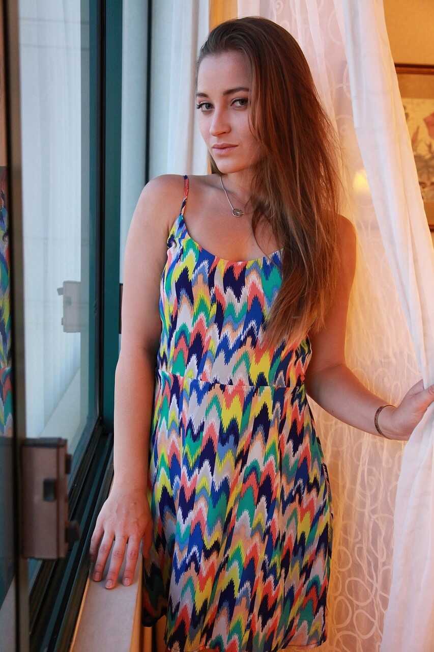 Dani Daniels' Colorful Dress Stripping: Big Ass and Natural Tits Exposed! - Dani Daniels