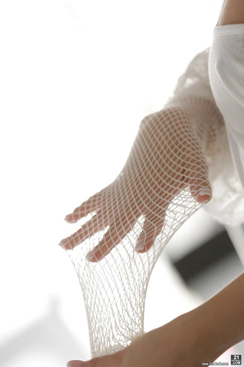 Black haired barefoot babe Vicky Love pets her perfect feet & dons fishnets: Purrfectly Sexy Feet for a MILF - Vicky Love