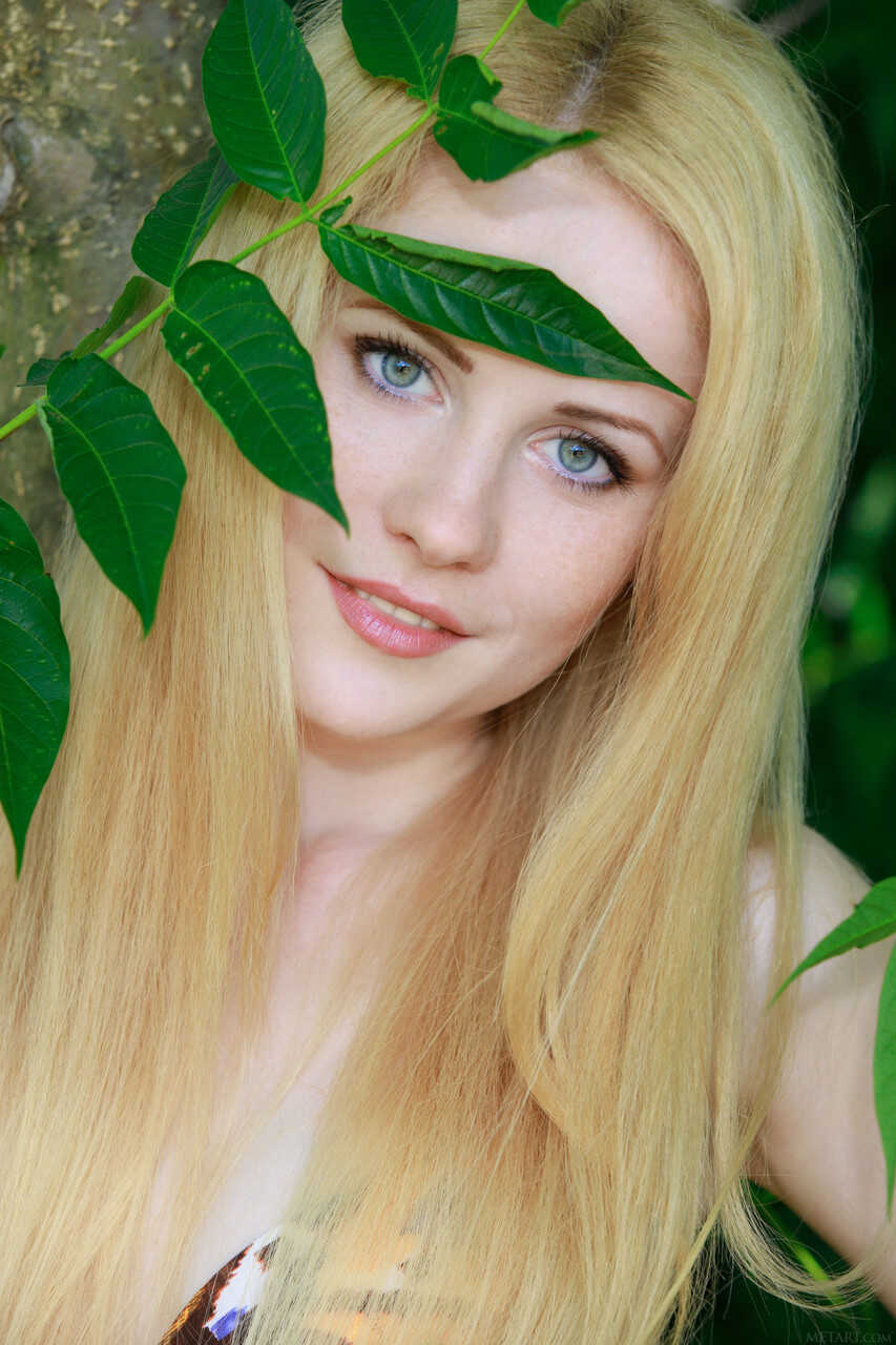 Blue eyed beauty Fay Love strips naked in the woods and shows off her big ass and beautiful face - Fay Love