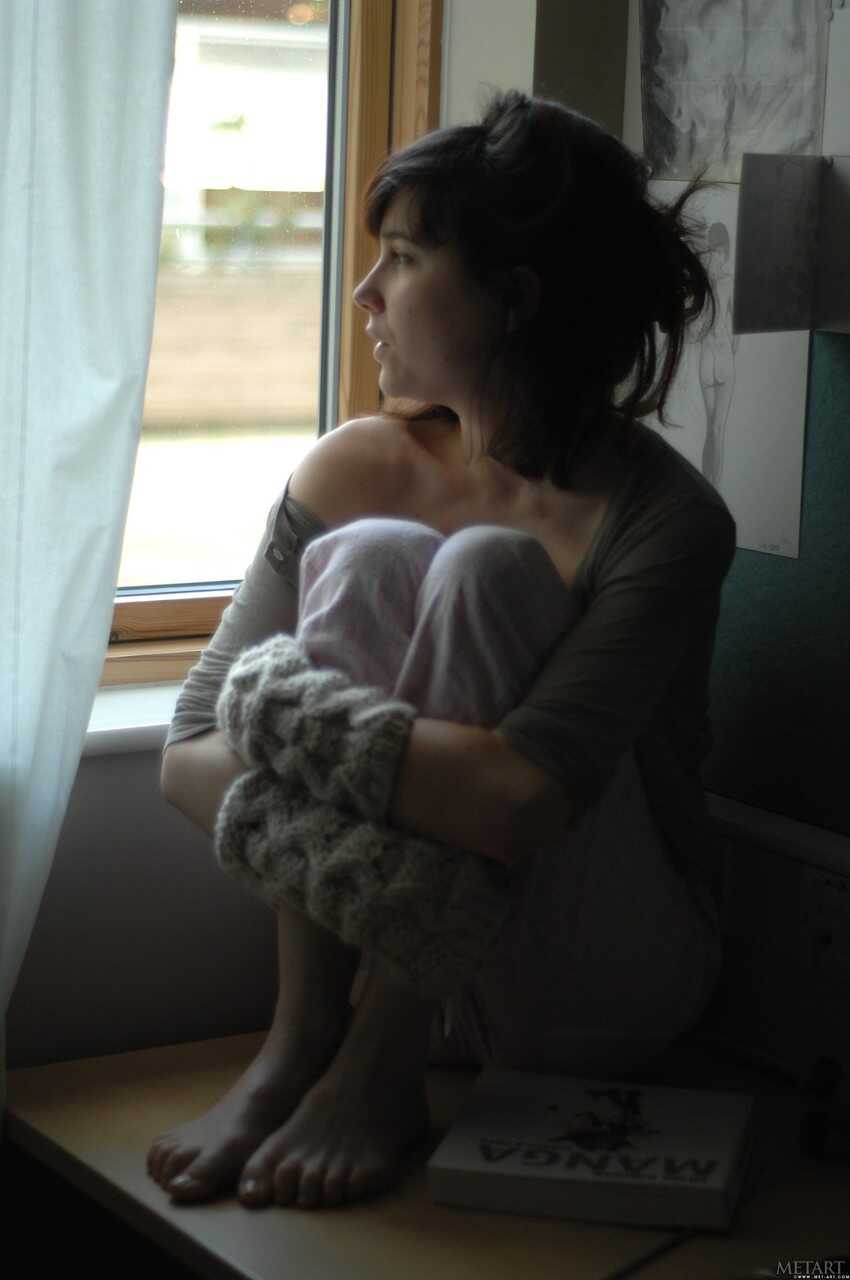 Thin and hairy Estelle K reads Manga in her natural skin while fingerless gloves slip off . - Estelle K