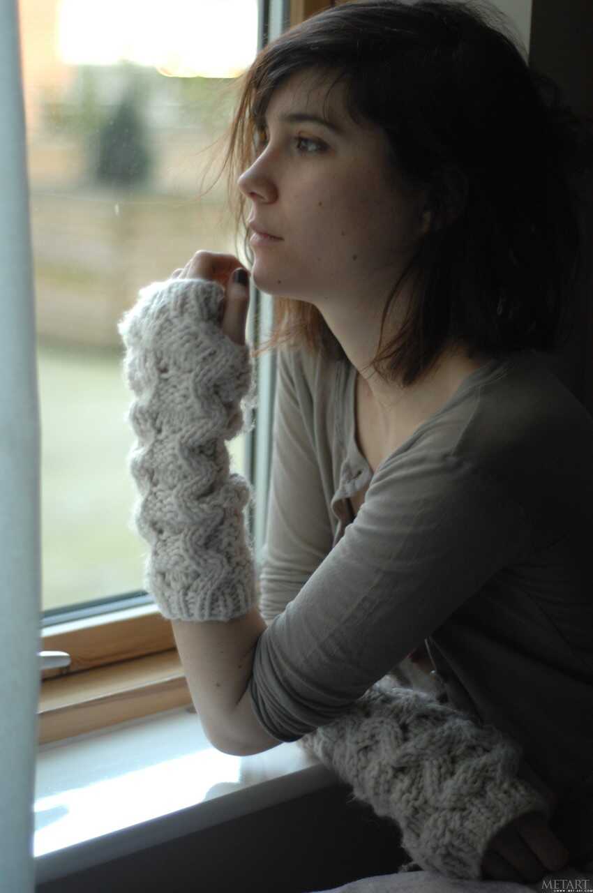 Thin and hairy Estelle K reads Manga in her natural skin while fingerless gloves slip off . - Estelle K