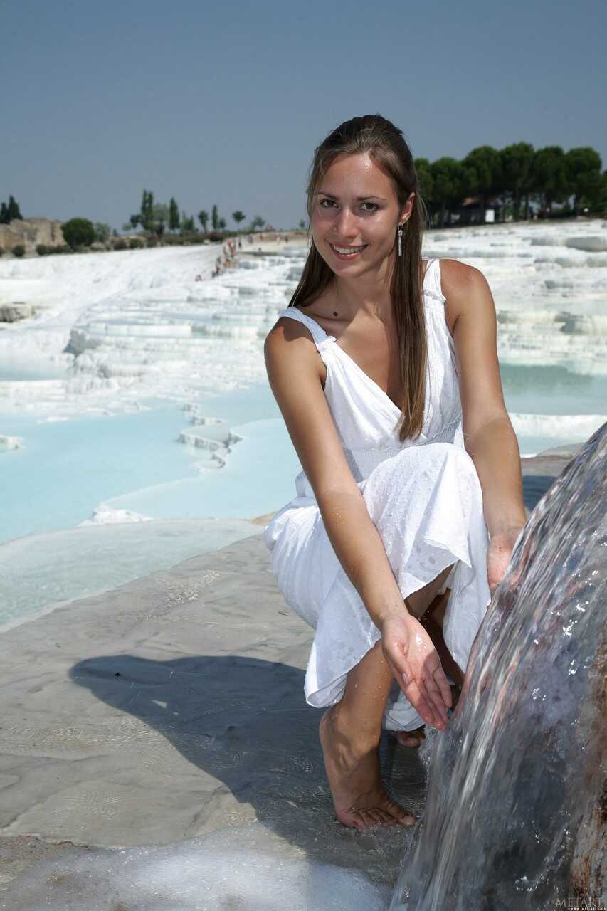 Sexy Brunette Alizeya A Exposes Her Uncovered Pussy on the Beach While Posing for Upskirt Pictures - Alizeya A